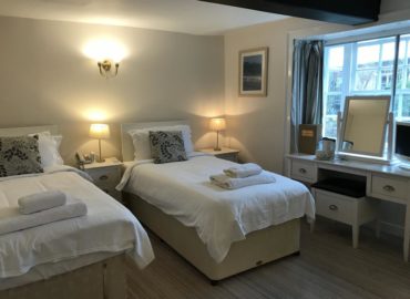 a twin room at the mariners hotel lyme regis